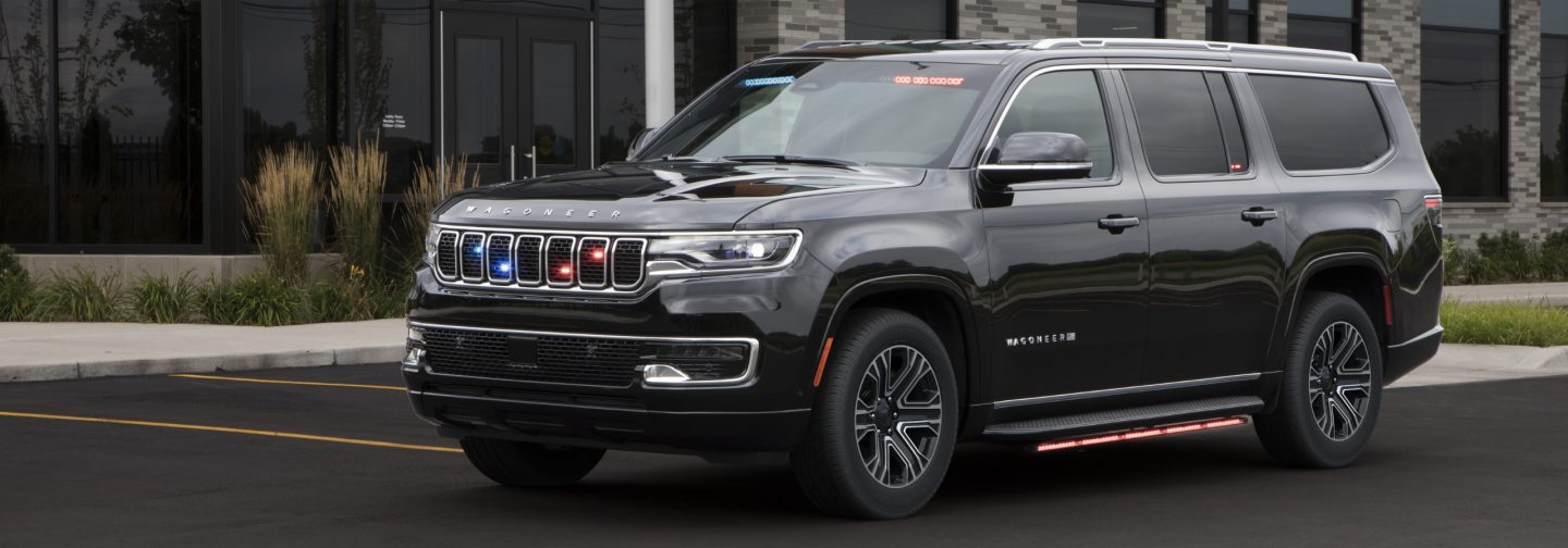 The 2025 Jeep Wagoneer Command Operations Vehicle with its flasher front end lights, beacon lights and and side lights on.