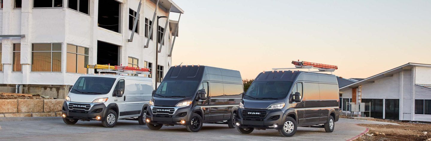  A lineup of three 2023 Ram ProMaster Vans: a 1500 Cargo Van, a 3500 Cargo Van Super High Roof and a Cargo Van High Roof.